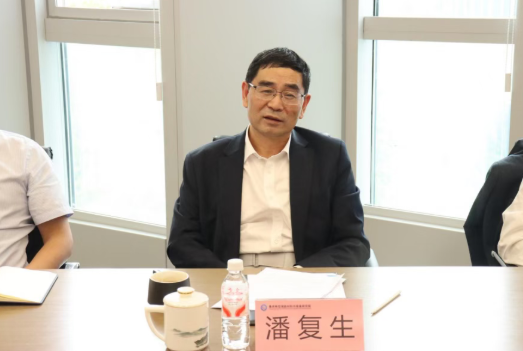 潘复生院士会见秀山县县长谭雪峰一行